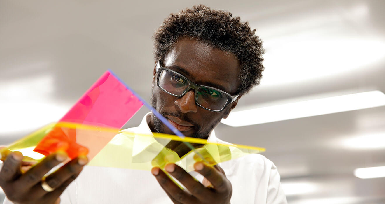 specialist working on etching components