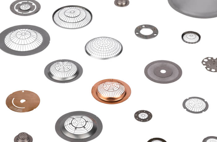 Photochemically etched grids